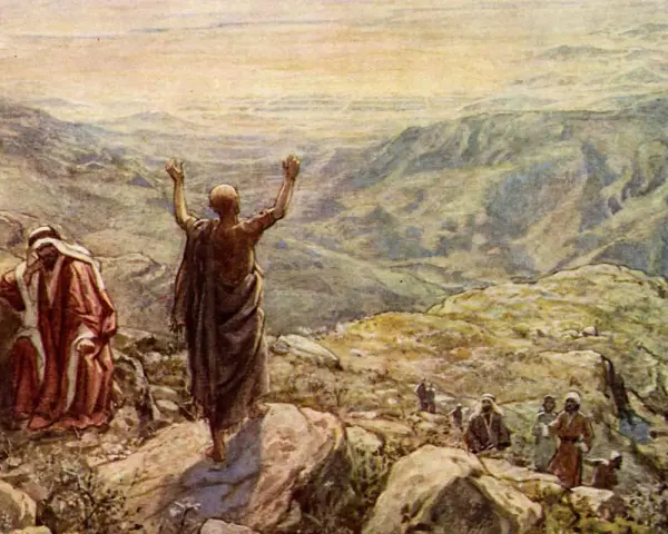 Balaam in the Bible, with arms raised, blesses Israel from a mountaintop. Another man in red looks on.