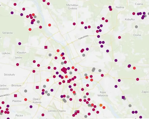 Mapa Warszawy z zaznaczonymi punktami o różnym natężeniu smogu.