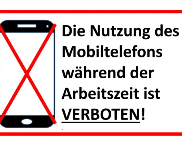 Handyverbot am Arbeitsplatz: Ein Smartphone mit rotem Kreuz zeigt an, dass die Nutzung während der Arbeitszeit untersagt ist.