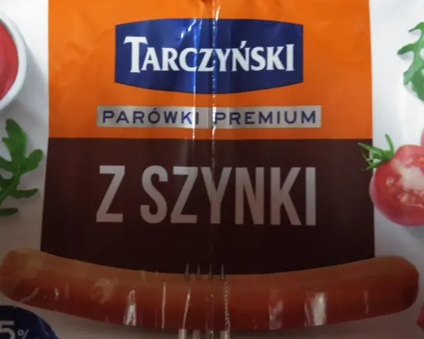 Parówki Tarczyński z szynki, premium, z pomidorami i rukolą. Idealne na szybki posiłek.