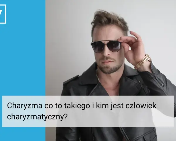 Charyzma co to? Mężczyzna w skórzanej kurtce i okularach przeciwsłonecznych, z pewnością siebie poprawiający okulary.