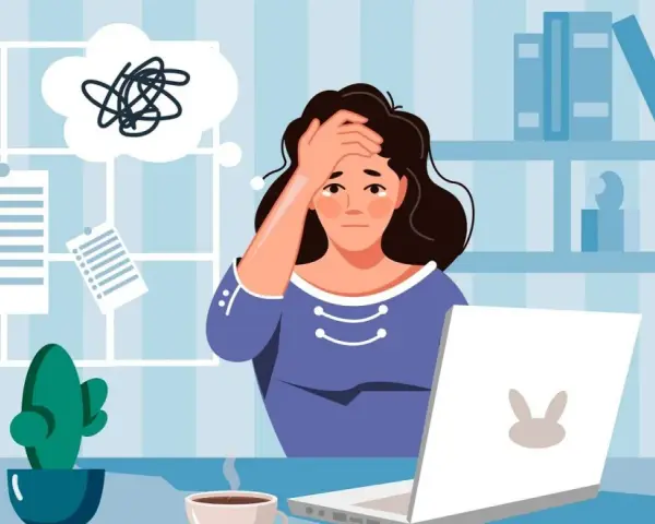 Mujer agobiada por papeleo y estrés laboral, pensando en una impugnación alta médica y reincorporación al trabajo.