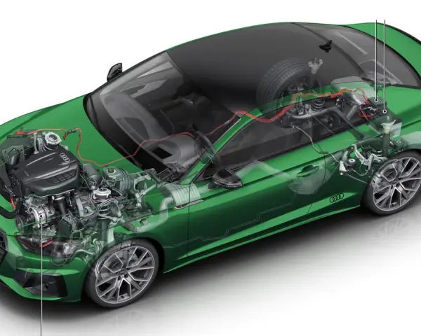 Przekrój zielonego Audi z widocznym silnikiem, elementami układu hybrydowego 48V i podzespołami.