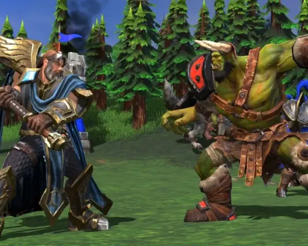 Rycerz z młotem i zielonoskóry ork szykują się do walki. Czyżby szukali kodów do Warcraft 3?