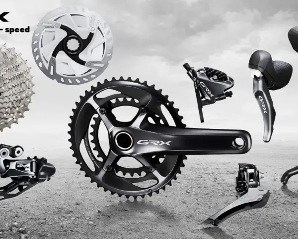 Komponenty rowerowe Shimano GRX: kaseta, korba, przerzutki, hamulce i manetki. Idealne do gravelowych wypraw.