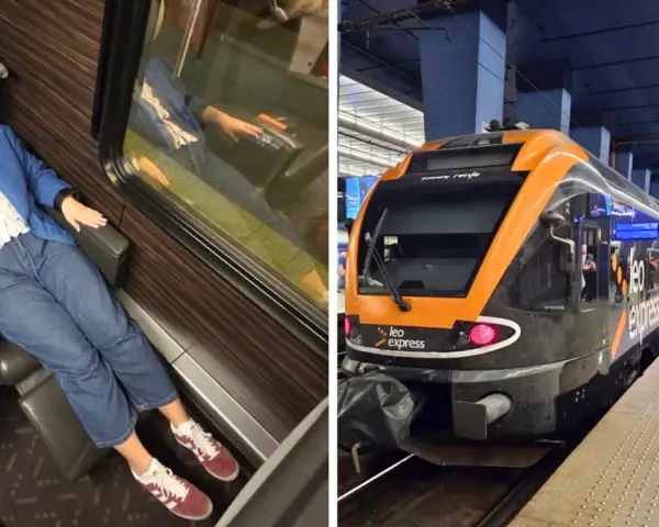 Uśmiechnięta kobieta w wygodnym fotelu w pociągu Leo Express, gotowa na podróż z Pragi do Warszawy.