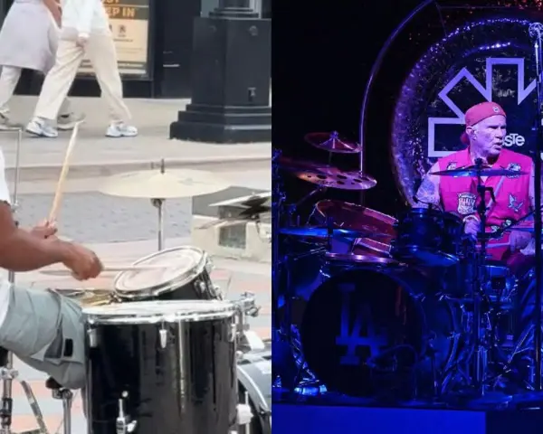 Perkusista Red Hot Chili Peppers na scenie i uliczny muzyk grający na bębnach.
