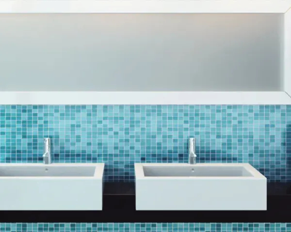 Salle de bain moderne avec double vasque, miroir rectangulaire et carrelage mural bleu. Idéal pour un calcul carrelage mural salle de bain.