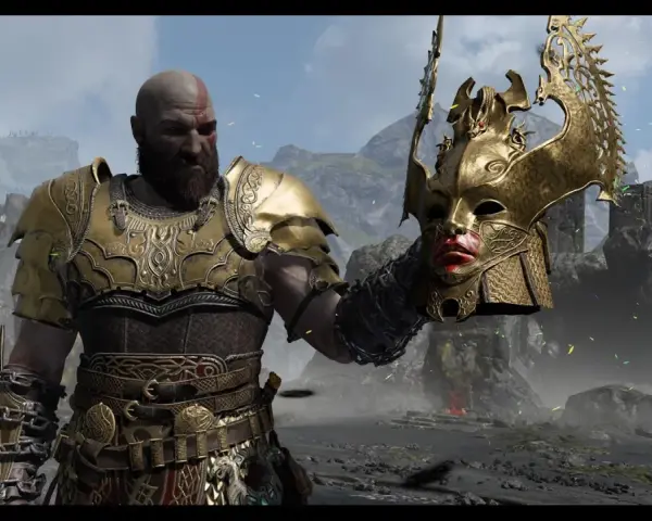 Kratos, el dios de la guerra, sostiene una máscara dorada de valquiria.