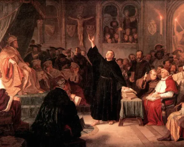 A monk preaches to a council of church leaders, including a Pope, during the Counter Reformation.