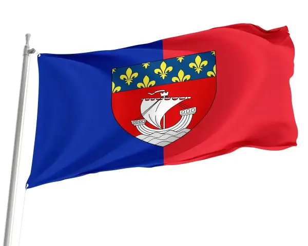 Flaga Paryża powiewa na maszcie. Dzieli się na dwie części: niebieską i czerwoną, a na środku widnieje herb z łodzią i liliami.