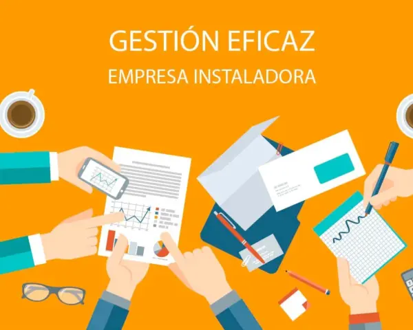 Manos analizando gráficos y documentos, elementos de la empresa para una gestión eficaz.