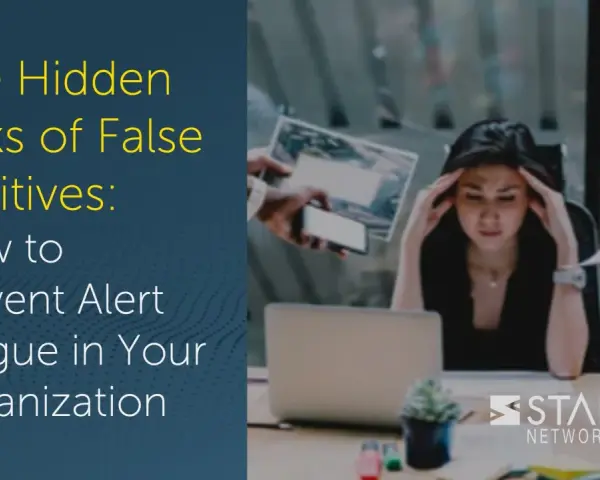 Overwhelmed woman at desk, surrounded by alerts. The image highlights the hidden risks of false positives, showing how they can lead to alert fatigue, impacting true positive detection.