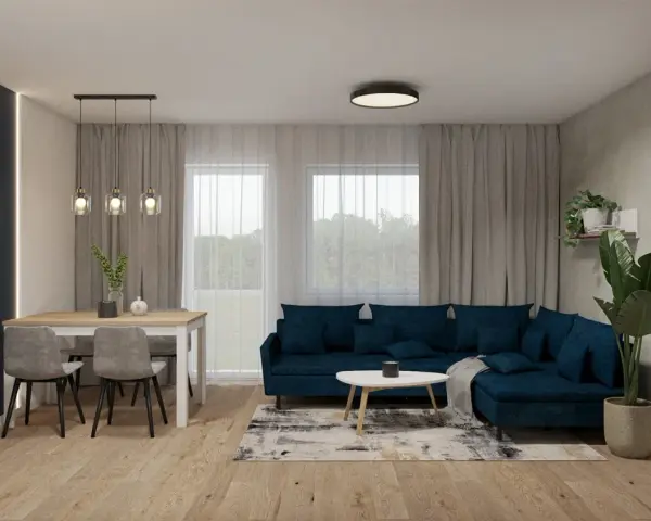 Nowoczesny salon z granatową kanapą i jadalnią. Dowiedz się, jak rozmieścić oświetlenie w salonie, by stworzyć przytulną atmosferę.