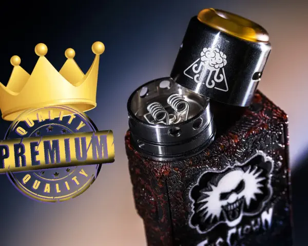 Vaper mod de alta calidad con calavera y corona dorada.