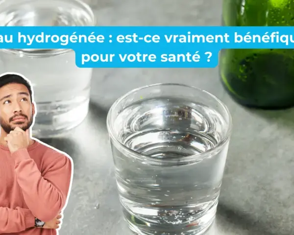 Un homme pensif regarde des verres d'eau, s'interrogeant sur les bienfaits de l'eau hydrogénée et le potentiel danger.