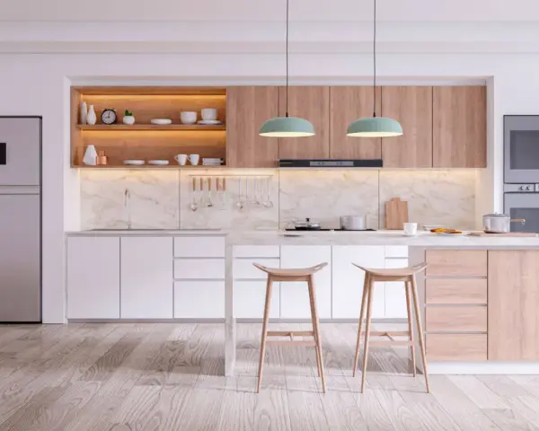 Cucine in cartongesso moderne con isola centrale, elettrodomestici integrati e finiture in legno chiaro.
