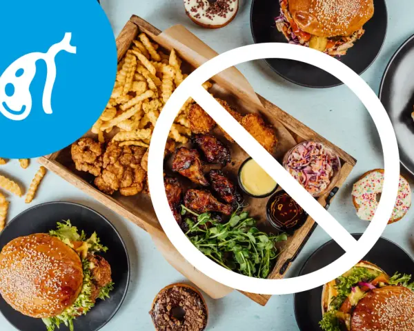 Symbol woreczka żółciowego i zakazane jedzenie typu fast food. Dieta dla woreczka żółciowego powinna unikać takich potraw.
