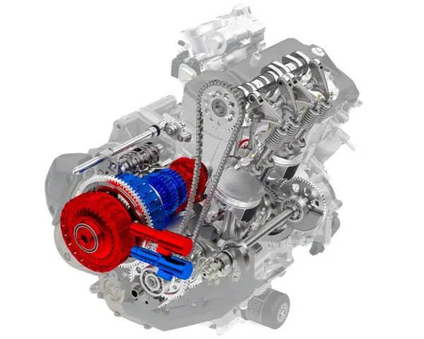 Corte detallado de un motor de moto automática, mostrando el embrague rojo y el engranaje azul.