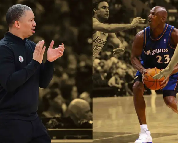 Trener Tyronn Lue klaszcze, podczas gdy Michael Jordan w barwach Wizards z piłką, obok gracza Lakers.
