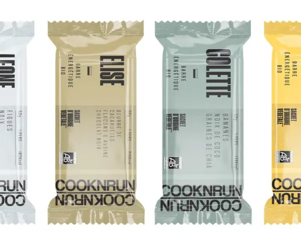 Quatre barres énergétiques bio Cooknrun : Léone (figue, noix, cacahuète, fleur de sel), Élise (chocolat noir, avoine, cacahuète), Colette (banane, noix de coco, chia), Marcelle (cacahuète, noisette). Un parcours nutritionnel savoureux.