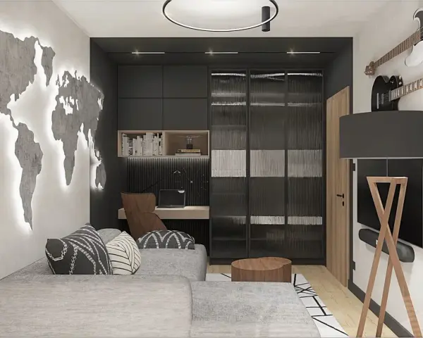 Męski pokój inspiracje: mapa świata na ścianie, gitary, wygodna sofa i biurko. Idealne miejsce dla podróżnika i muzyka.