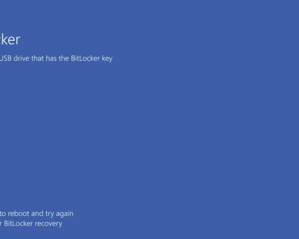 Ekran BitLocker: podłącz USB z kluczem BitLocker. Naciśnij Enter, by zrestartować, lub Esc, by odzyskać dostęp.