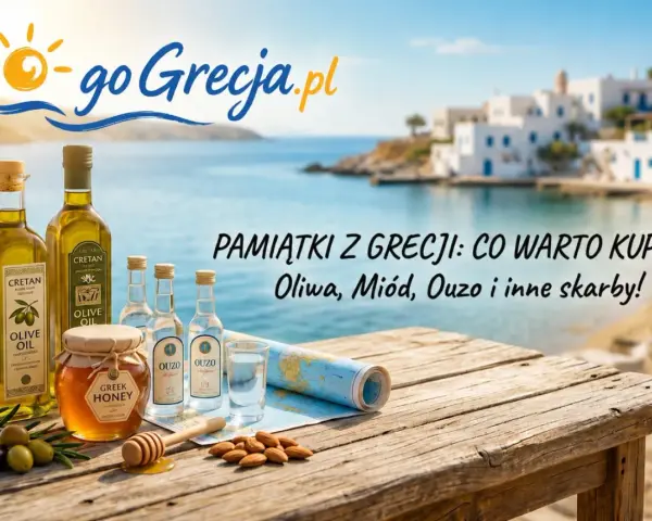 Oliwa, miód, ouzo – co przywieźć z Grecji? Pamiątki z wakacji na stole z widokiem na grecką wyspę.
