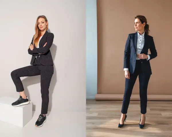 Dwie kobiety w eleganckich garniturach. Jedna w sportowych butach, druga w szpilkach. Jakie buty do garnituru damskiego zimą?