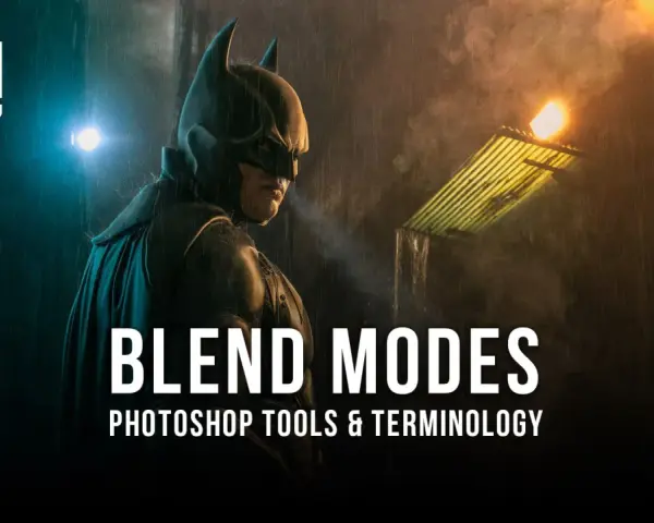 Batman sous la pluie, avec le texte "BLEND MODES" et le logo Photoshop. Apprenez le mode de fusion Photoshop pour des créations épiques.