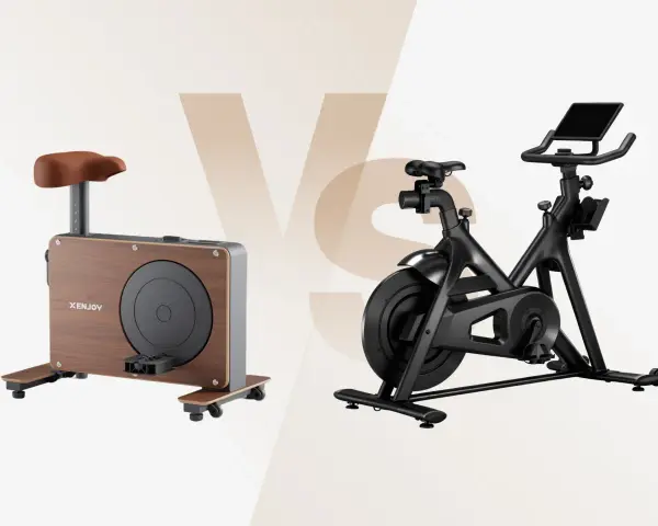 Comparing two stationary bikes: one with a wood finish and minimalist design, the other a sleek black model with a screen. Weighing the pros and cons of stationary bike workouts.