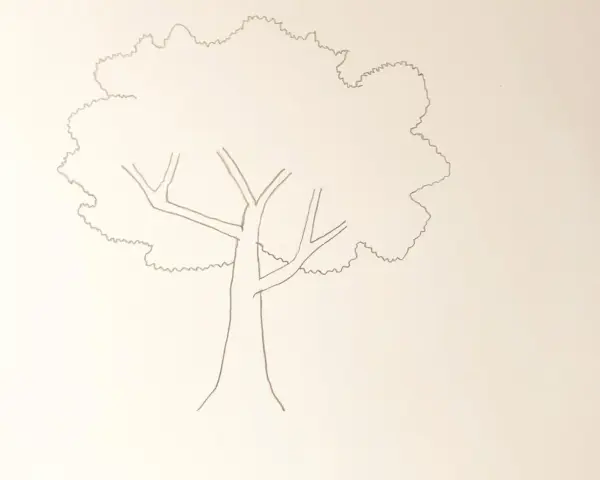 Un dessin arbre facile, avec un tronc simple et une couronne aux contours ondulés, prêt à être coloré.