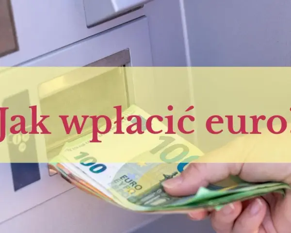 Dłoń wkłada banknoty euro do bankomatu.