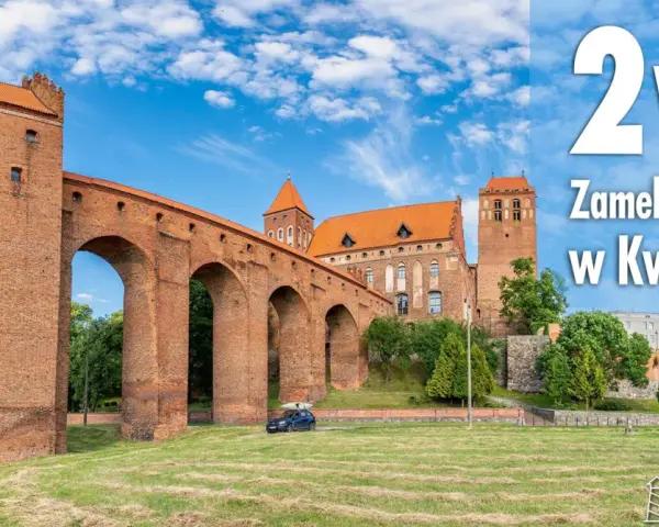 Imponujący zamek i katedra w Kwidzynie, jedne z najciekawszych atrakcji w województwie pomorskim, pod błękitnym niebem.