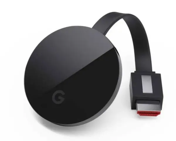 Czarny Chromecast z logo Google i kablem HDMI. Dowiedz się, jak podłączyć Chromecast do telewizora.