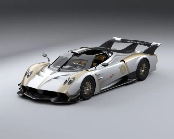 Srebrno-złoty Pagani Huayra R Evo z numerem 1, gotowy do wyścigu.