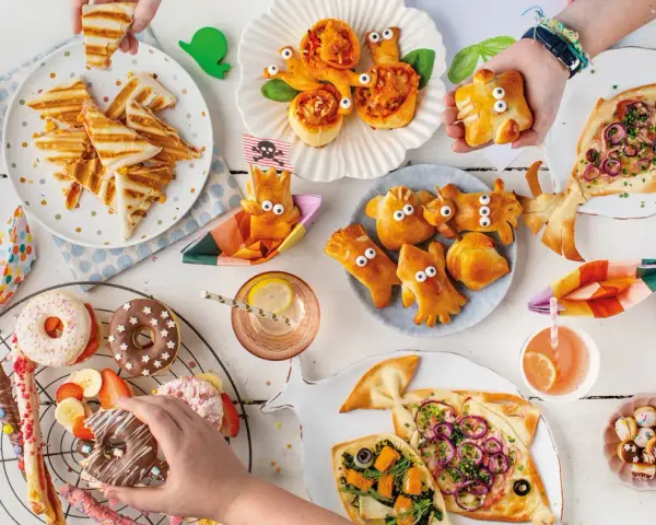 Kreatives schnelles Backen mit Kindern: lustige Teigtiere, Fischpizza und bunte Donuts.