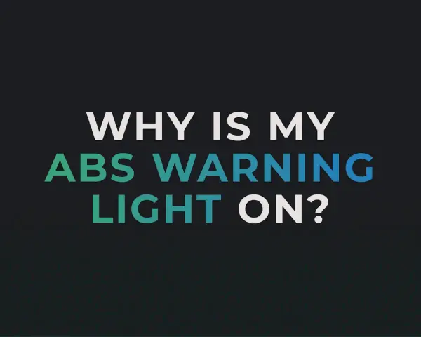 Warum leuchtet mein ABS-Warnlicht? Text auf dunklem Hintergrund.