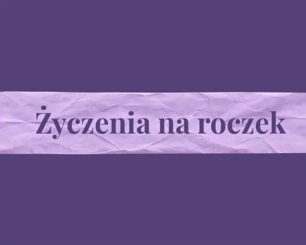 Fioletowa taśma z napisem "Życzenia na roczek". Idealna do ozdobienia kartek z życzeniami.