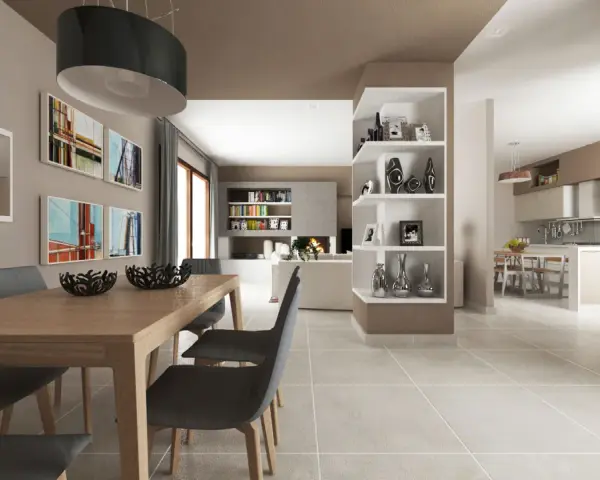 Un soggiorno moderno con tavolo da pranzo, sedie grigie e scaffali bianchi. I soffitti colorati tortora creano un'atmosfera calda e accogliente.