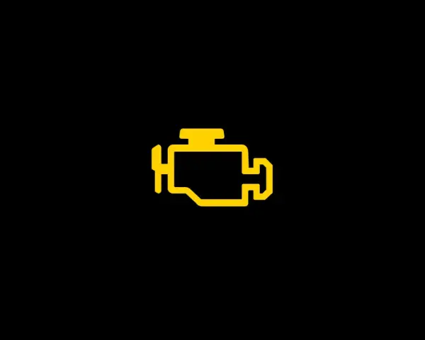 Gelbe Motorkontrollleuchte leuchtet auf dem Armaturenbrett eines VW Tiguan 2.0 TDI.