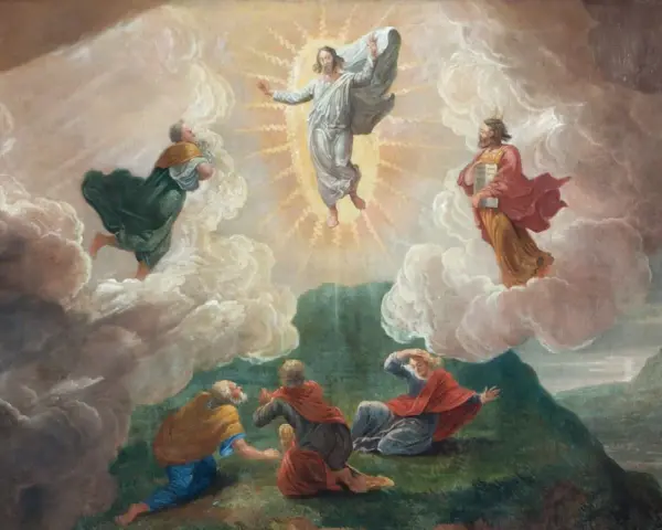 Jesus transfigures in glory, surrounded by Moses and Elijah, as disciples witness the divine event on the feast of the Transfiguration of the Lord.