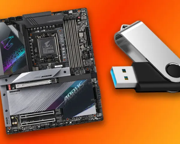 Płyta główna AORUS i pendrive gotowe do aktualizacji BIOS.