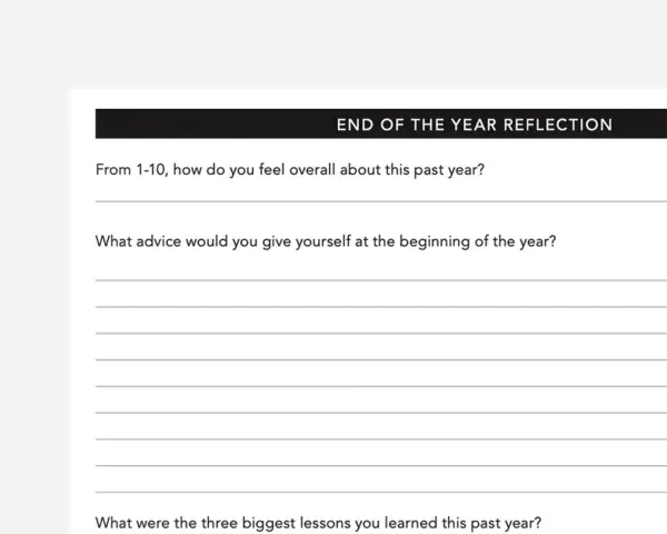 Journal prompts for end of year reflection: rate your year, advice for your past self, and biggest lessons learned.