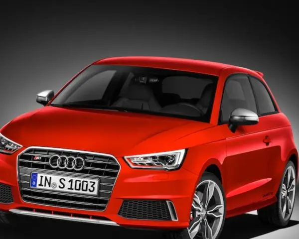 Czerwony Audi S1 z przodu, z tablicą rejestracyjną IN S 1003.