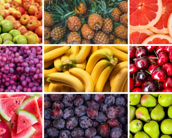 En färgsprakande blandning av c vitamin frukt: äpplen, ananas, grapefrukt, vindruvor, bananer, körsbär, vattenmelon och plommon.