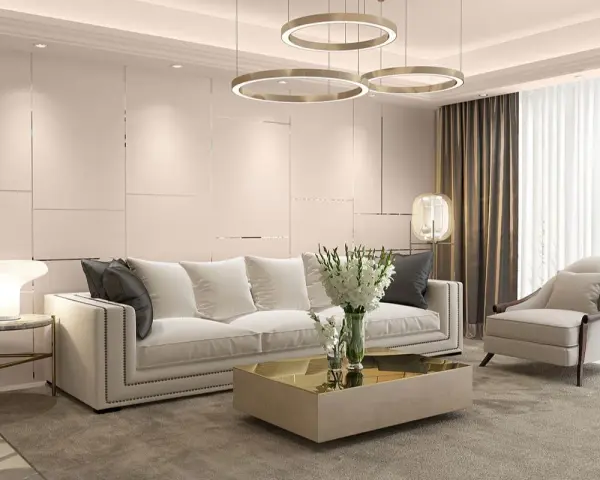 Elegancki salon w stylu art deco z białą sofą, złotym stolikiem kawowym i designerskimi lampami.