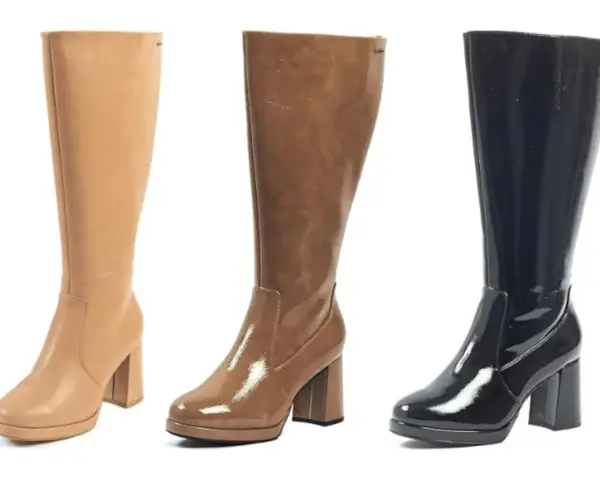 Tres botas altas de tacón, una beige de cuero, otra marrón brillante y una negra charol. La caña de una bota es la parte que cubre la pierna.