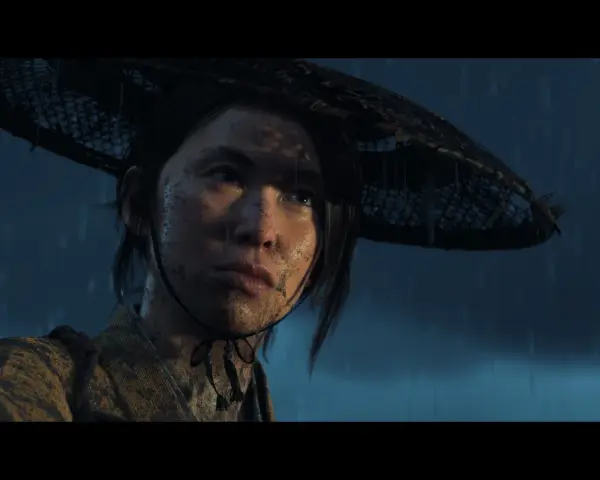 Młoda kobieta w deszczu, z błotem na twarzy, w tradycyjnym stroju i kapeluszu. Czy to zapowiedź Ghost of Tsushima 2?