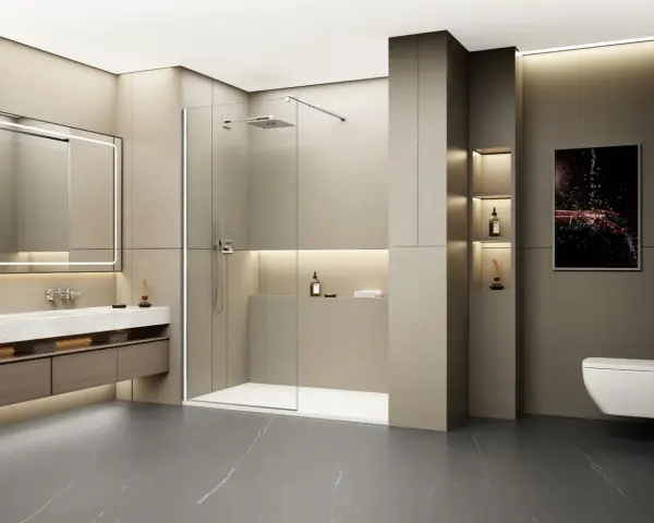 Une douche à l'italienne moderne, spacieuse et épurée, avec une paroi en verre, un pommeau de douche carré et un receveur blanc.